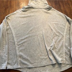 Umgee brand grey turtleneck sweater, kind of cropped fit but not short